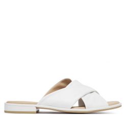 Klapki Caprice. Białe klapki damskie Caprice, bez wzorów, bez obcasa. Za 299.99 zł.