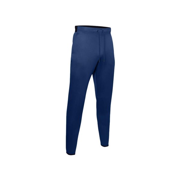 Spodnie dresowe Under Armour MOVE. Niebieskie spodnie sportowe męskie Under Armour, m, bez wzorów, z bawełny, na fitness i siłownię. Za 329.90 zł.