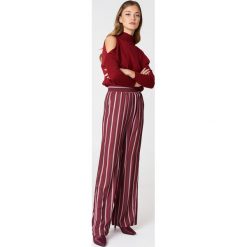 NA-KD Szerokie spodnie z wysokim stanem - Red,Multicolor. Spodnie materiałowe damskie marki NA-KD. W wyprzedaży za 48.78 zł.
