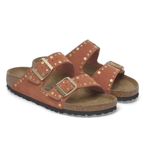 Damskie sandały nity ARIZONA RIVET. Brązowe sandały damskie Birkenstock, bez wzorów, z materiału, bez obcasa, bez zapięcia. Za 657.00 zł.