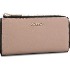 Duży Portfel Damski CALVIN KLEIN - Drive Large Zip Arou K60K604503 007. Brązowe portfele damskie Calvin Klein, ze skóry ekologicznej. Za 299.00 zł.