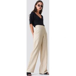 Trendyol Luźne spodnie z panelami po bokach - Brown,Nude. Brązowe spodnie materiałowe damskie Trendyol. Za 121.95 zł.