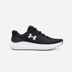 Buty fitness damskie UA Charged Surge 4. Czarne obuwie sportowe damskie Under Armour, bez wzorów, z materiału, na fitness i siłownię. Za 199.99 zł.