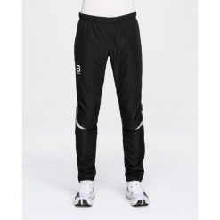 Spodnie narciarskie Daehlie Sportswear Winner 4.0. Czarne spodnie snowboardowe męskie DAEHLIE, l, bez wzorów, z materiału, narciarskie. Za 587.50 zł.