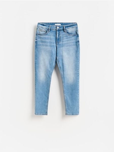 Jeansy slim fit z efektem sprania - niebieski. Niebieskie jeansy męskie Reserved. Za 159.99 zł.