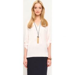 BLUZKA DŁUGI RĘKAW LUŹNA. Bluzki damskie TOP SECRET. W wyprzedaży za 39.99 zł.