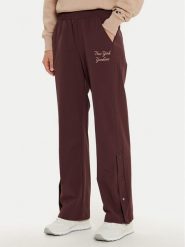 Champion Spodnie dresowe 117511 Brązowy Wide Leg. Brązowe spodnie dresowe damskie Champion, m, bez wzorów, z dresówki. Za 239.99 zł.