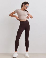 Damskie legginsy z wysokim stanem, squat proof, z kieszeniami Sense czekoladowe. Brązowe legginsy damskie Aim'n, xl, bez wzorów, z elastanu. Za 346.00 zł.