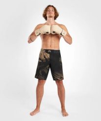 Venum Spodenki MMA Gorilla Jungle. Czarne krótkie spodenki sportowe męskie VENUM, m, bez wzorów, z elastanu. Za 350.19 zł.
