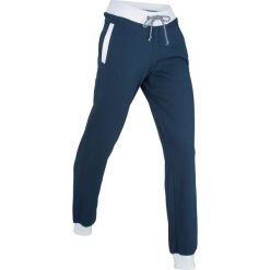 Spodnie sportowe, długie bonprix ciemnoniebieski. Niebieskie spodnie dresowe damskie bonprix. Za 74.99 zł.