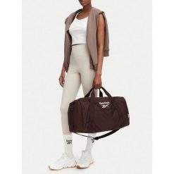 Torba sportowa Reebok. Brązowe plecaki damskie Reebok, bez wzorów, sportowe. Za 129.99 zł.