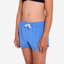 Szorty surfingowe dla dzieci Olaian 100 Katy. Niebieskie spodenki dla dziewczynek OLAIAN, bez wzorów, z materiału, sportowe. Za 39.99 zł.