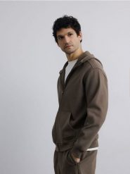 Rozpinana bluza z kapturem - jasny zielony. Zielone bluzy męskie Reserved, l, bez wzorów, z dzianiny, z kapturem. Za 139.99 zł.