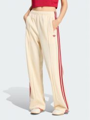 Adidas Spodnie dresowe Firebird Loose Tracksuit KS4671 Kremowy Loose Fit. Białe spodnie dresowe damskie Adidas, xl, bez wzorów, z dresówki. Za 298.99 zł.