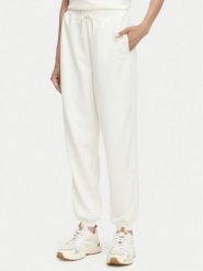Guess Spodnie dresowe V6YB09 K4292 Kremowy Regular Fit. Białe spodnie dresowe damskie Guess, l, z aplikacjami, z dresówki. Za 394.99 zł.