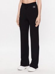 Calvin Klein Jeans Spodnie dresowe J20J222114 Czarny Relaxed Fit. Czarne spodnie dresowe damskie Calvin Klein Jeans, m, bez wzorów, z dresówki. Za 469.99 zł.