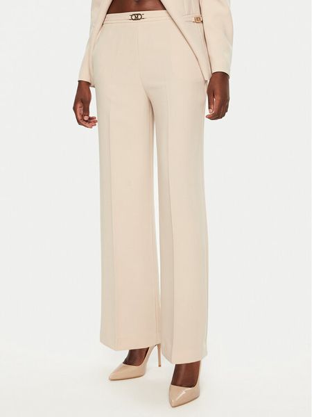 Marciano Guess Spodnie materiałowe 5RGB02 7115A Beżowy Regular Fit. Brązowe spodnie materiałowe damskie Marciano Guess, z aplikacjami, z materiału. Za 389.99 zł.