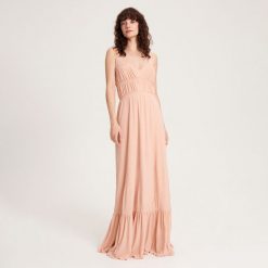 Sukienka maxi na ramiączkach - brzoskwiniowy. Pomarańczowe sukienki damskie Reserved, l, bez wzorów, z dzianiny, bez kołnierzyka, bez ramiączek, maxi. W wyprzedaży za 69.99 zł.