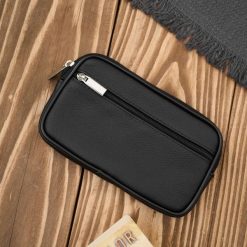 Męska skórzana saszetka na pasek do ręki czarna ABR-53. Czarne saszetki męskie ze skóry. Za 57.81 zł.