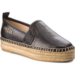 Espadryle GUESS - Rela FLRLE2 FAM14 BLACK. Czarne espadryle damskie Guess, z aplikacjami, z materiału. W wyprzedaży za 299.00 zł.
