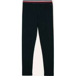 Tommy Hilfiger - Legginsy dziecięce 128-164 cm. Niebieskie legginsy dla dziewczynek Tommy Hilfiger, bez wzorów, z bawełny. Za 119.90 zł.