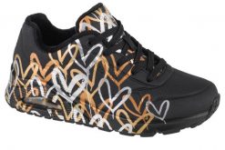 Buty do chodzenia sneakersy damskie Skechers Uno-Metallic Love. Czarne obuwie sportowe damskie Skechers, bez wzorów, z materiału, trekkingowe. Za 359.99 zł.