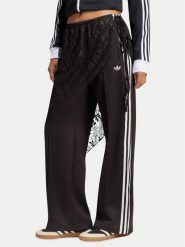 Adidas Spodnie dresowe 2In1 Firebird Loose Track Trousers With Lace Skirt LG4275 Brązowy Relaxed Fit. Brązowe spodnie dresowe damskie Adidas, xs, bez wzorów, z bawełny. Za 369.99 zł.