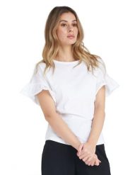 Błyszcząca damska koszulka z krótkim rękawem i falbaną. Białe koszulki sportowe damskie LEONE 1947 APPAREL, l, bez wzorów, z bawełny, bez kołnierzyka, bez ramiączek, na fitness i siłownię. Za 84.16 zł.
