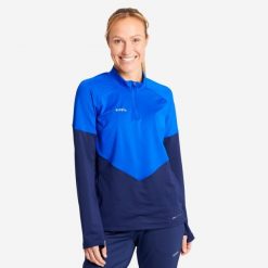 Bluza do piłki nożnej damska Kipsta Viralto. Niebieskie bluzy sportowe damskie KIPSTA, s, bez wzorów, z elastanu, bez kaptura, do piłki nożnej. Za 109.99 zł.