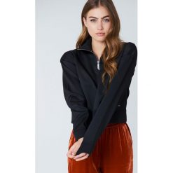 Calvin Klein Bluza z zamkiem Harika - Black. Czarne bluzy damskie Calvin Klein, z nadrukiem. W wyprzedaży za 81.18 zł.