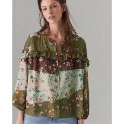 Bluzka oversize z falbaną - Brązowy. Bluzki damskie Mohito. Za 119.99 zł.