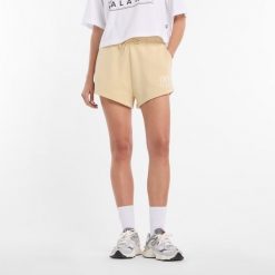 Spodenki damskie New Balance WB61Y80AABC – żółte. Żółte szorty sportowe damskie New Balance, l, bez wzorów, z bawełny, klasyczne. Za 199.99 zł.