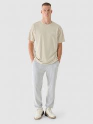 4F T-shirt oversize z nadrukiem męski - beżowy S. Brązowe koszulki sportowe męskie 4f, m, bez wzorów, z bawełny, klasyczne, bez kołnierzyka. W wyprzedaży za 29.99 zł.
