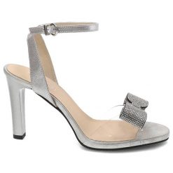 Srebrne Sandały Kordel Eleganckie Buty Z Kokardą. Szare klapki damskie Kordel, z aplikacjami, eleganckie, bez obcasa, na obcasie. Za 379.00 zł.