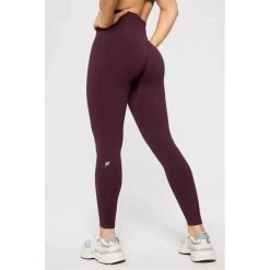 FABLETICS Damskie Legginsy Sportowe Wysoki Stan Seamless Scrunch. Czerwone legginsy damskie FABLETICS, l, bez wzorów, z materiału, z podwyższonym stanem, długie, na fitness i siłownię. Za 299.99 zł.