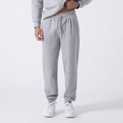 Ikoniczne Spodnie Z Mankiecikiem Siwy Melanz Bawelna, Poliester. Szare spodnie materiałowe męskie Everlast, m, bez wzorów, z bawełny. Za 194.60 zł.