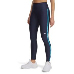 Legginsy Under armour model 6006027-403 dla kobiet. Niebieskie legginsy damskie Under Armour, s, bez wzorów, z materiału. Za 280.97 zł.