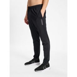 Spodnie dresowe Hummel TE Strength. Czarne spodnie sportowe męskie Hummel, m, bez wzorów, z dresówki, do piłki nożnej. Za 185.00 zł.