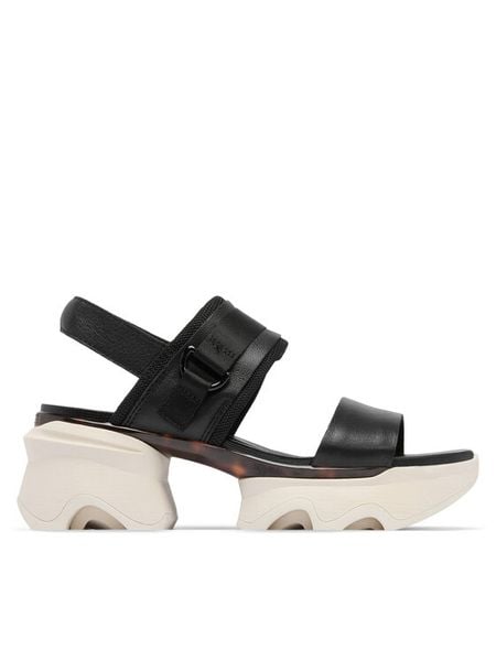 Sorel Sandały KINETIC™ Impact Slingback Heel 2030481 Czarny. Czarne sandały damskie Sorel, bez wzorów, ze skóry, bez obcasa, na słupku, bez zapięcia. Za 399.99 zł.