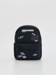 Plecak z aplikacjami - czarny. Czarne torby i plecaki dziecięce Reserved, z materiału, małe. Za 99.99 zł.