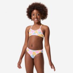 Kostium kąpielowy dwuczęściowy dla dzieci Decathlon Boni Vahine. Białe stroje kąpielowe dla dziewczynek Decathlon, bez wzorów, z elastanu. Za 39.99 zł.