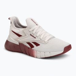 Buty treningowe damskie Reebok Nano Gym. Szare obuwie sportowe damskie Reebok, bez wzorów, z materiału, na fitness i siłownię. Za 399.99 zł.