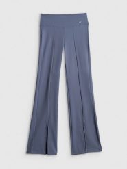 4F Spodnie do jogi z rozszerzanymi nogawkami damskie - niebieskie XL. Niebieskie spodnie sportowe damskie 4f, l, bez wzorów, ze skóry, na jogę i pilates. Za 169.99 zł.