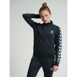 Damska kurtka zapinana na zamek Hummel hmlnelly 2.0. Czarne kurtki damskie Hummel, na wiosnę, l, bez wzorów, z materiału, bez kaptura, na fitness i siłownię. Za 138.00 zł.