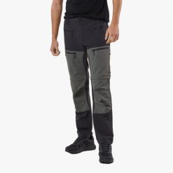 Spodnie Wędrówki męskie Swedemount Lofoten Stretch Zip-Off Pants wodoodporne. Czarne spodnie sportowe męskie SWEDEMOUNT, m, bez wzorów, z tkaniny, trekkingowe. Za 449.99 zł.