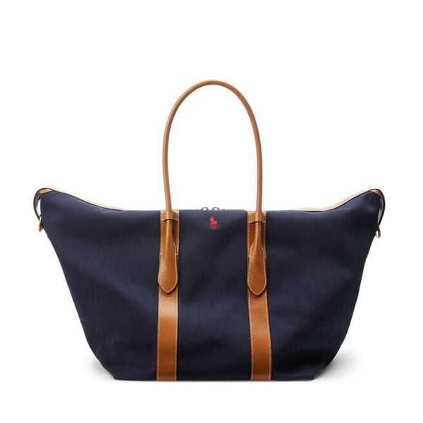 Torebka Polo Ralph Lauren. Niebieskie torebki do ręki damskie Polo Ralph Lauren, bez wzorów, bez dodatków. Za 1,652.99 zł.