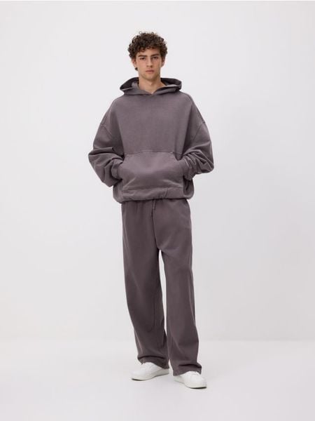 Bluza boxy z kapturem - ciemnoszary. Szare bluzy męskie Reserved, l, bez wzorów, z bawełny, z kapturem. W wyprzedaży za 119.99 zł.