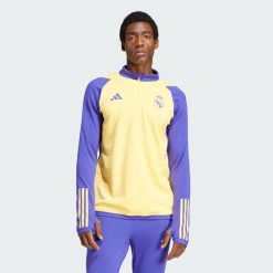 Bluza Real Madrid Tiro 23 Training. Żółte bluzy męskie Adidas, xl, bez wzorów, z materiału, bez kaptura, do piłki nożnej. W wyprzedaży za 270.55 zł.