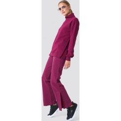 NA-KD Spodnie sportowe z haftem - Purple. Fioletowe spodnie sportowe damskie NA-KD, z haftami. W wyprzedaży za 99.37 zł.