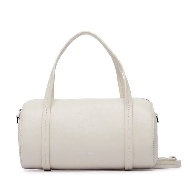 Torebka Calvin Klein. Białe torebki do ręki damskie Calvin Klein, bez wzorów, klasyczne, bez dodatków. Za 440.99 zł.